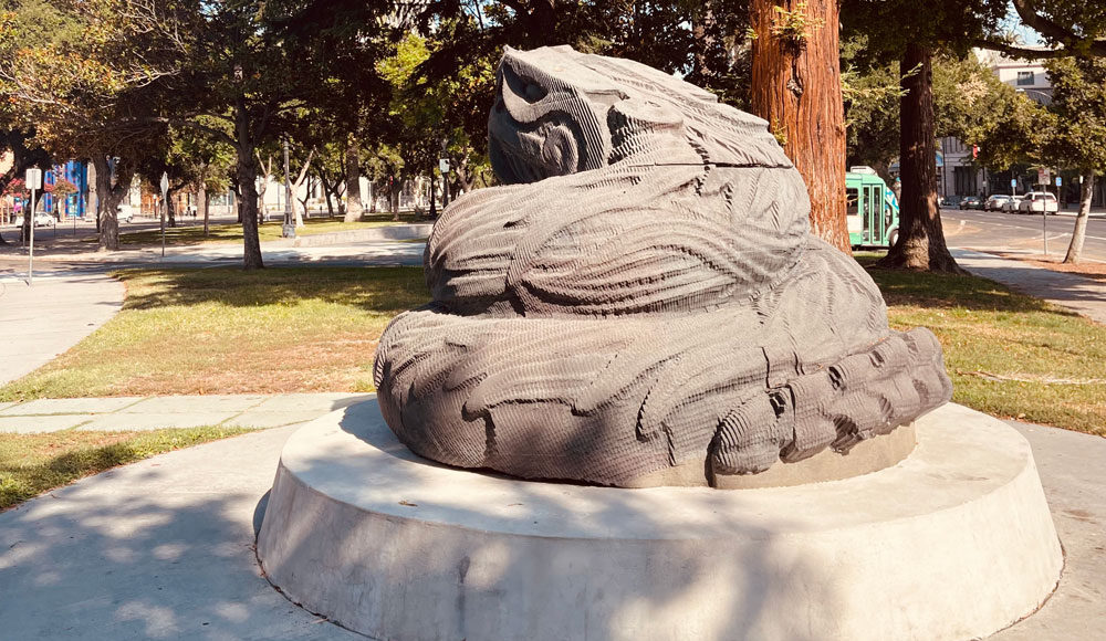 Giant statue of a coiled snake