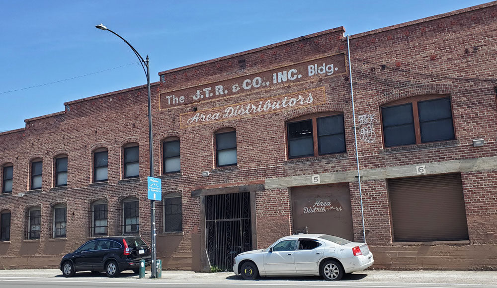 Front of a two-story brick building