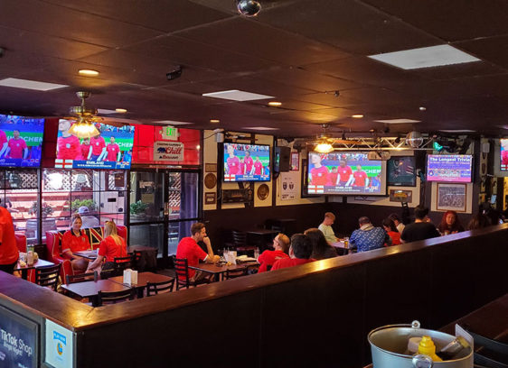 Interior of a sparts pub with many TV screens