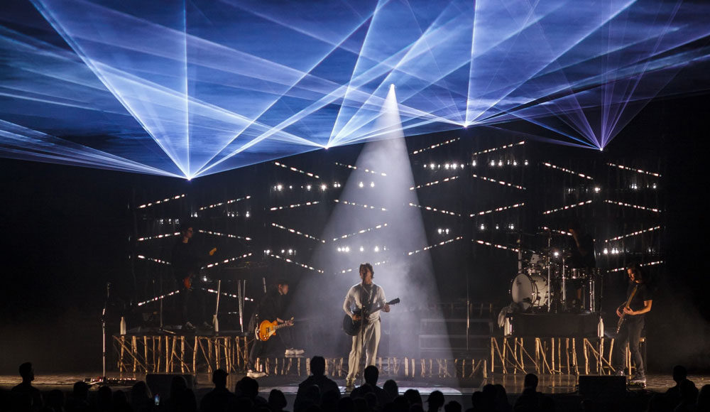 Photo of musicians on a big stage