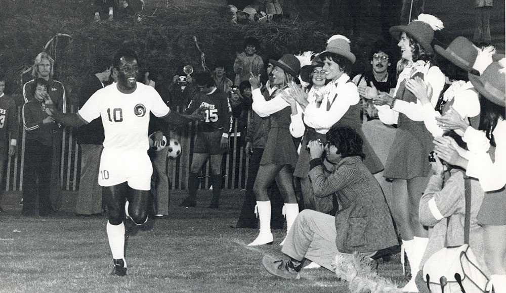 Soccer player on the field in front of a crowd