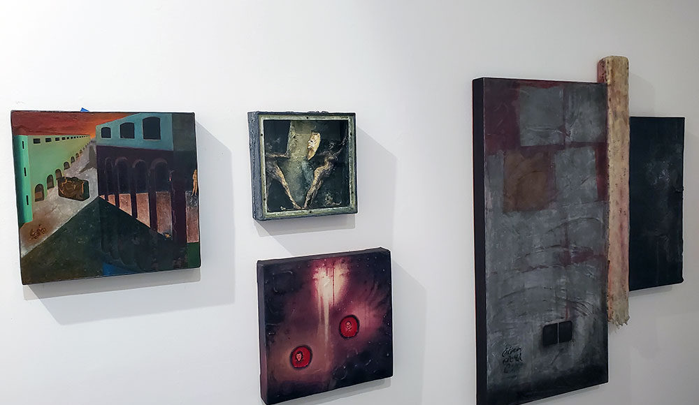 Paintings on a gallery wall