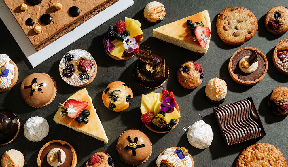 Rows of elaborately crafted French-style pastries