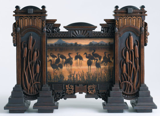 Painting encased in a large and elaborately carved wooden frame