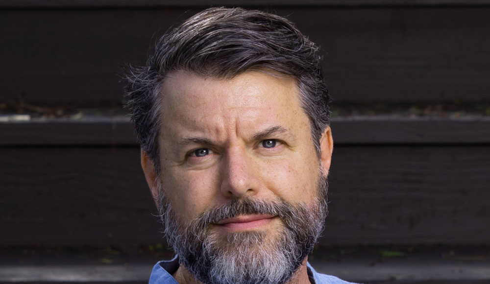 Head shot of bearded man