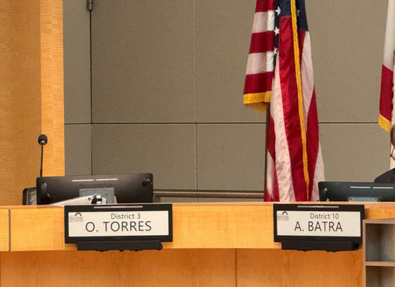 Empty seat at a city meeting