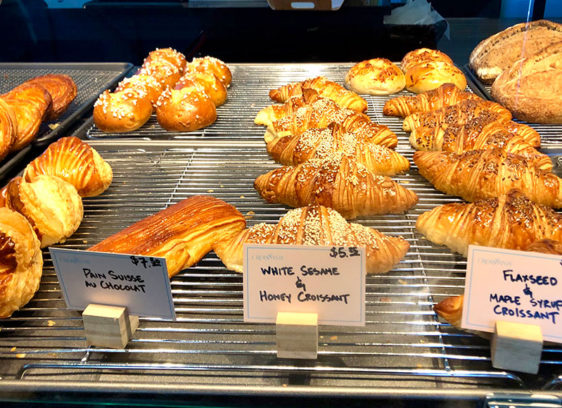 Racks of croissants and other pastries