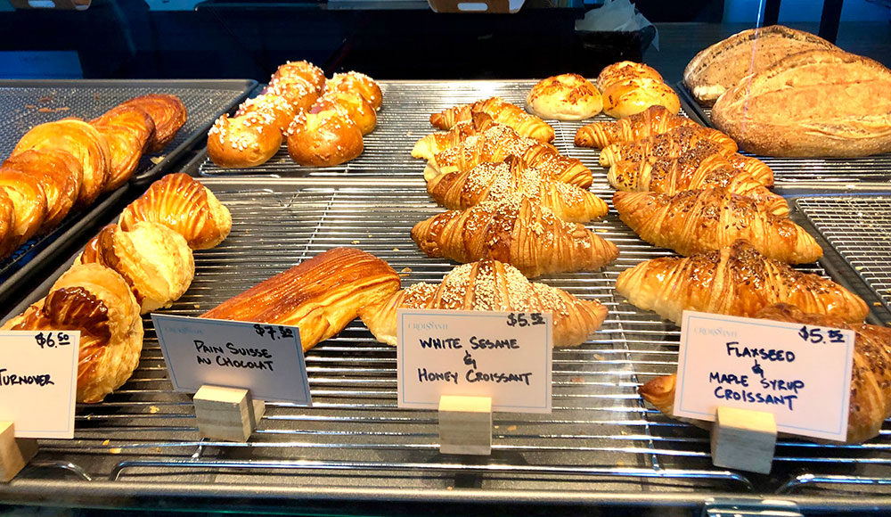 Racks of croissants and other pastries