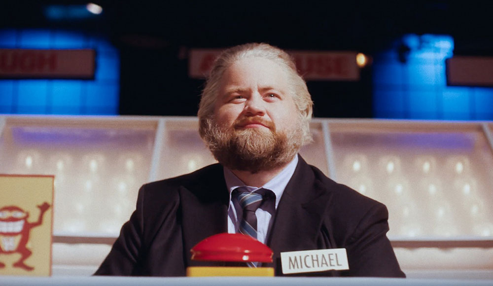 Man on the set of a game show